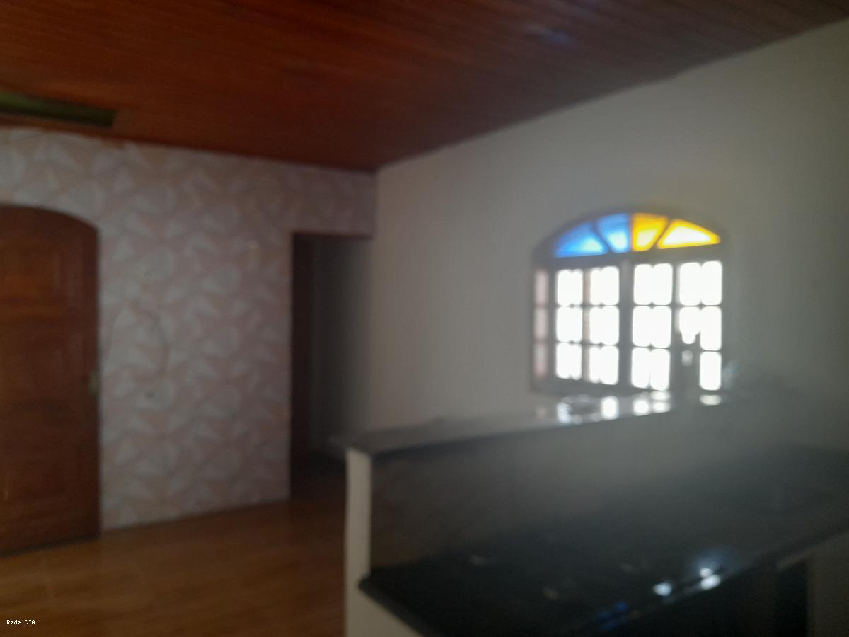 Cozinha, sala e quarto sute