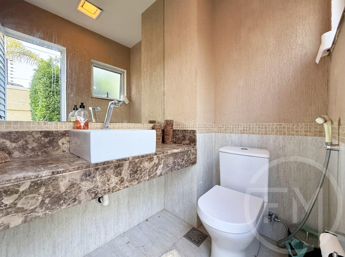 Lavabo externo da casa  venda no condomnio Portofino