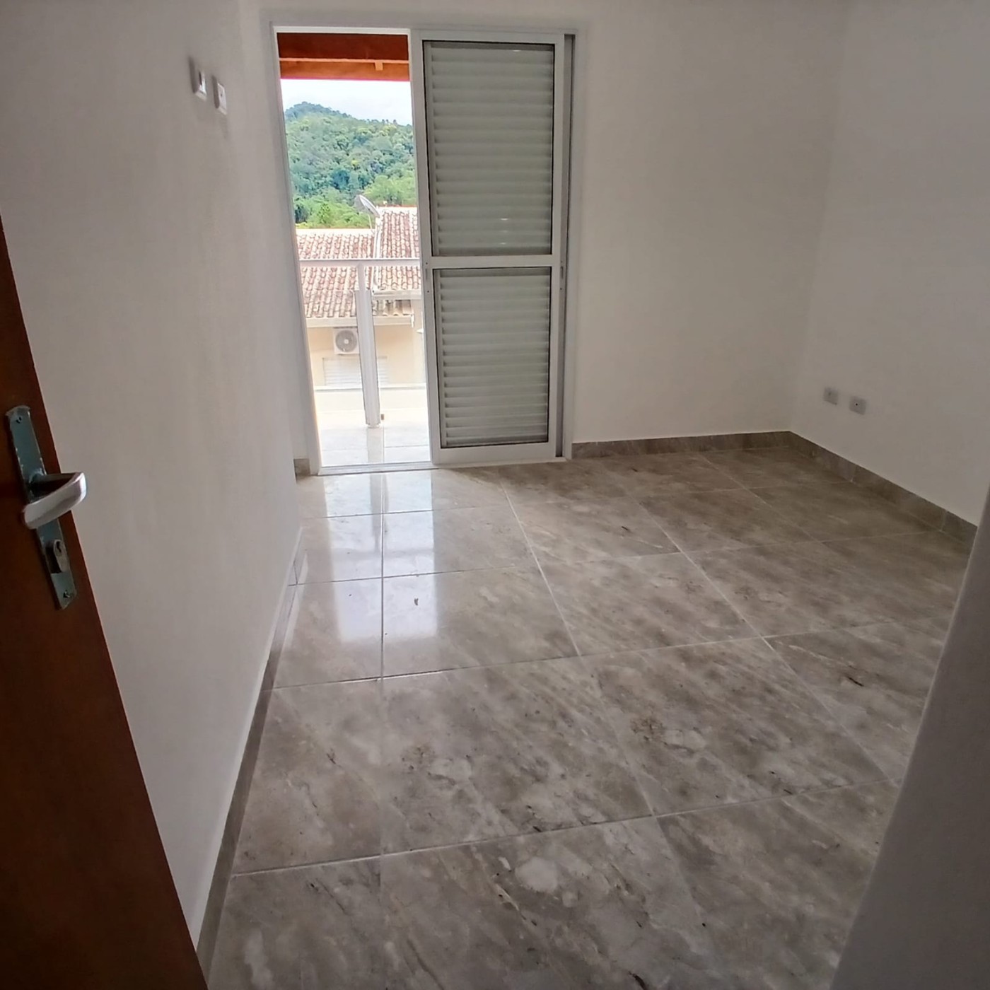 Quarto casal com varanda