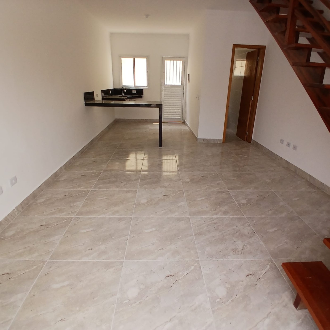 Sala integrada com a cozinha