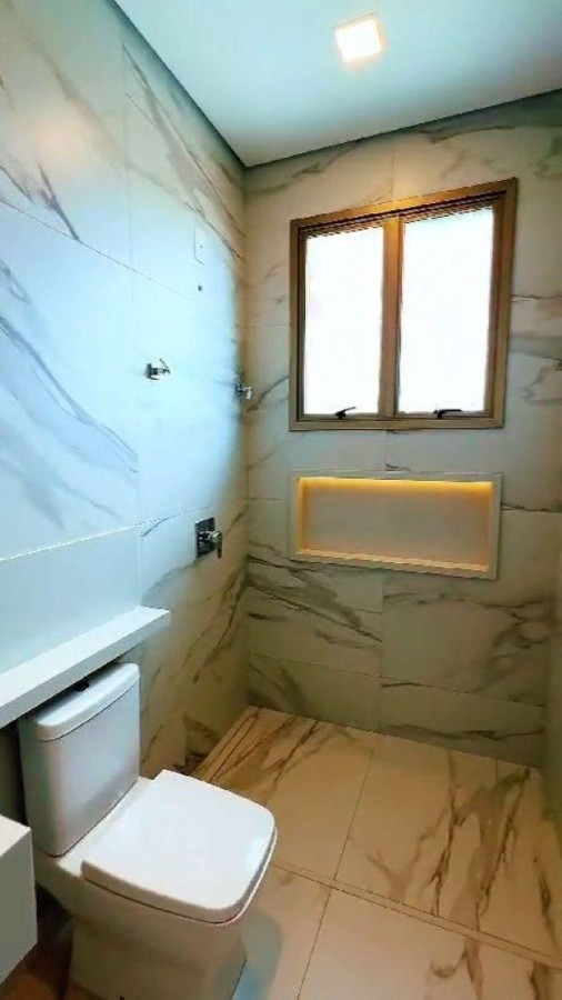 Um dos 4 suites da casa de 4 quartos e 4 vagas no gran park 1 vespasiano