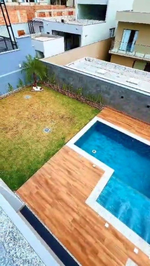 Piscina aquecida com cascata e iluminação em led