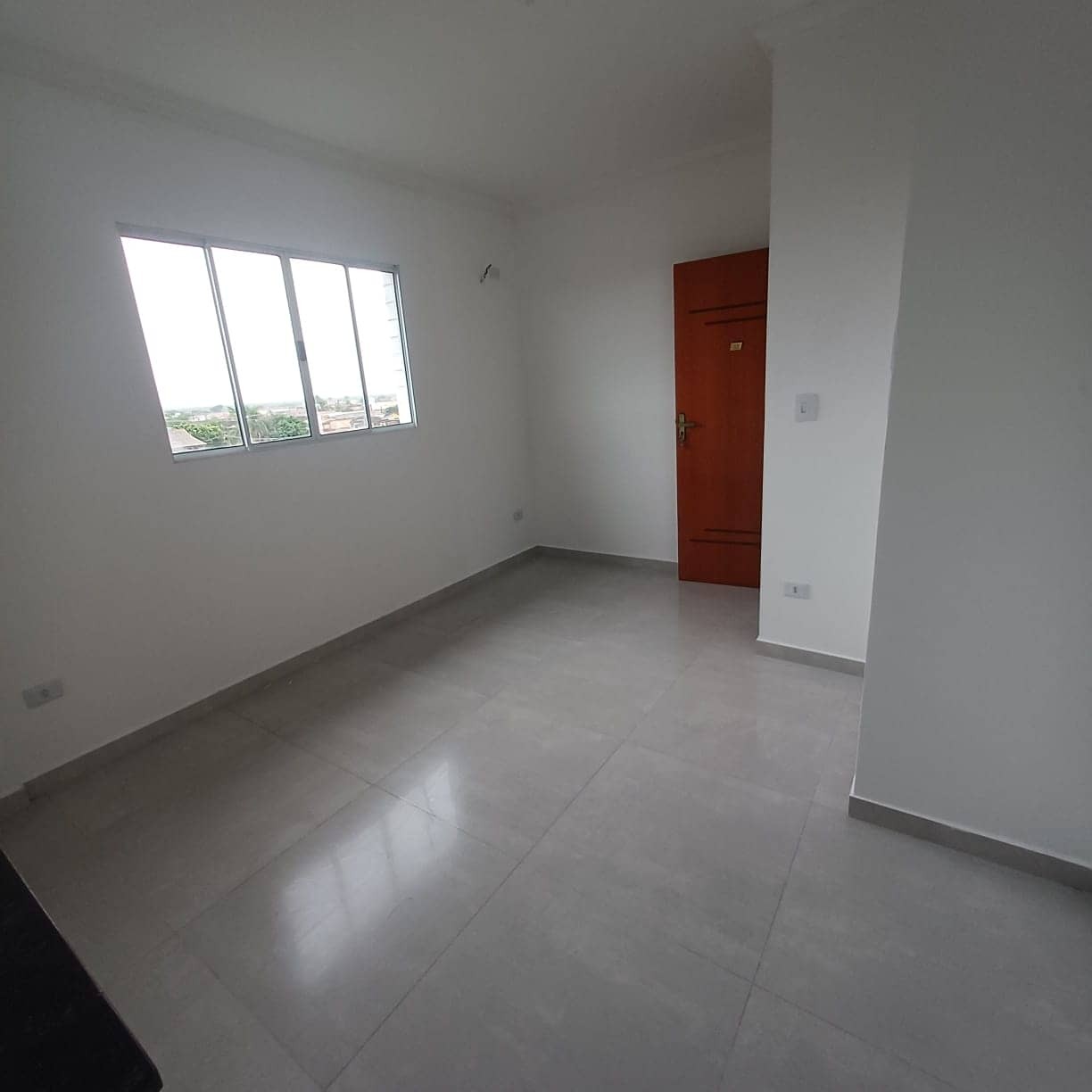 Sala-ampla-apartamento-2-quartos-com-garagem-São-Vicente-esplanda-dos-barreiros