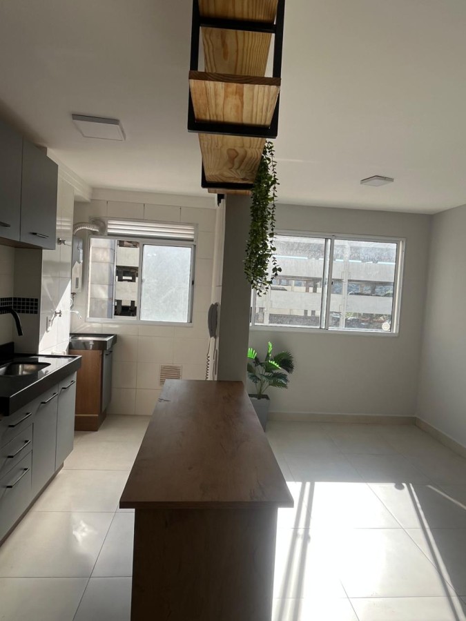 Cozinha americana com vista para a sala - apartamento São Mateus
