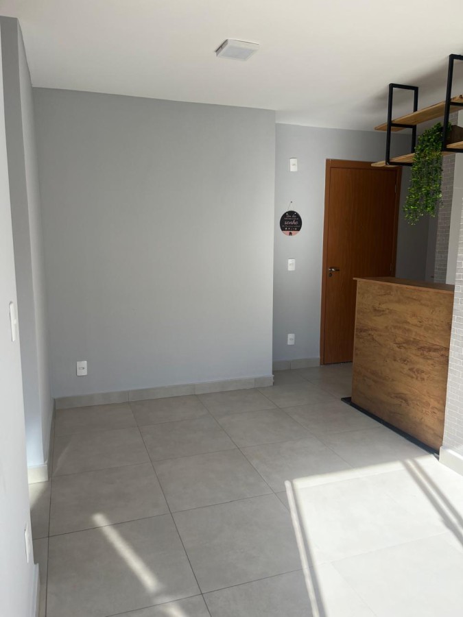 Sala integrada à entrada - apartamento reformado