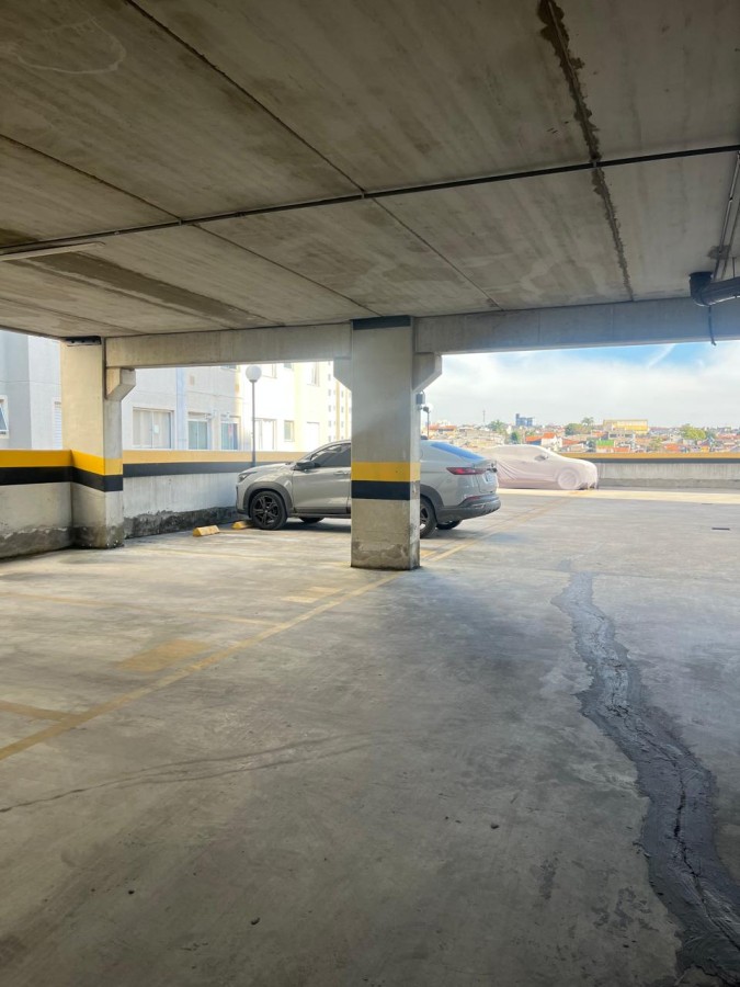 Garagem coberta do condomínio