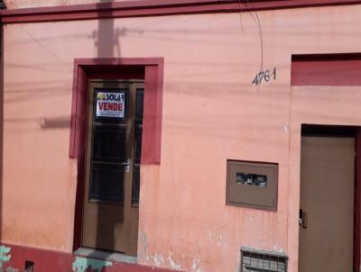 Casa para Venda, em Santana do Livramento, bairro Centro, 2 dormitórios, 1 banheiro, 1 vaga